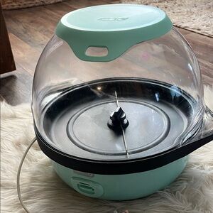 Dash SmartStore Stirring Popcorn Maker in mint green color